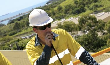 Construction worker with two way radio